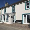 Отель Lovely 3-bed Cottage, Portmahomack Next to Harbour в Тайнани