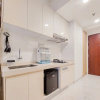 Отель Homey And Cozy Studio Sky House Bsd Apartment Near Aeon, фото 10