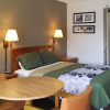Отель Travelers Inn & Suites, фото 28
