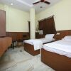 Отель SPOT ON 6856 Eshi Guest House, фото 7