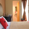 Отель RedDoorz near RS USU Medan 3, фото 23