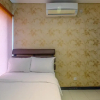 Отель Comfort And Homey 2Br At Nifarro Park Apartment, фото 8