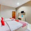 Отель OYO Flagship Tembok Batu Residence, фото 4