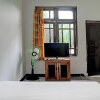 Отель SPOT ON 92856 Home Stay Syariah Aom Kusman, фото 21