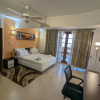 Отель Lux Suites Lamera Beachfront Apartments, фото 4