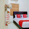 Отель OYO 3606 Kost Kartini Syariah, фото 3