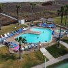 Отель Beachfront Resort * Heated Pool * Sleeps Heaps (Saida Royale 9039) by RedAwning, фото 21