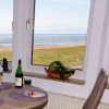Отель Whg 11 im Haus Nordseeperle - gemütliche Ferienwohnung in direkter Strandlage mit Meerblick, фото 6