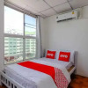 Отель OYO 550 Happyland Guesthouse, фото 5