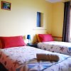 Отель Surat Bay Lodge & Backpackers Hostel в Оваке