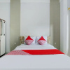 Отель OYO Flagship 90756 Melasti Hills Room & Cafe, фото 7