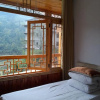 Отель Zhang Jiajie Longquan Inn, фото 32