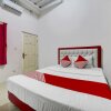 Отель Super OYO 91173 Guesthouse King Puntodewo, фото 6