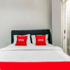 Отель OYO Life 91239 Kost Rosandy House Yogyak, фото 3