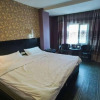 Отель Hongxing Times Holiday Hotel (Xinjiang Normal University Wenguang Campus), фото 4