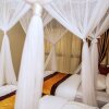 Отель Beautiful 2-bedroom Apartment in Entebbe, фото 4