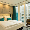 Отель Motel One Munich - Parkstadt Schwabing, фото 3
