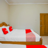 Отель OYO 90210 Kenari House Syariah, фото 10
