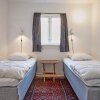 Отель Two-Bedroom Holiday home in Svaneke 5, фото 9
