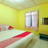 Отель OYO 92503 Penginapan & Villa Sirait, фото 3