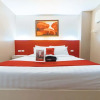 Отель Reddoorz Plus @ Hotel Metro, фото 3
