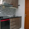 Отель Homey And Simple Studio Apartment At Taman Melati Margonda, фото 4