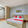 Отель OYO Flagship Tembok Batu Residence, фото 6