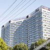 Отель Qushe Service Apartment (Langfang Convention & Exhibition Center), фото 1