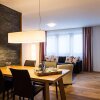 Отель TITLIS Resort Wohnung 202 в Энгельберге