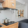 Отель Comfy And Strategic 2Br At Bassura City Apartment, фото 7
