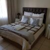 Отель Ezulwini Guest House, фото 4