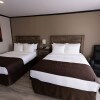 Отель Motel 7 Inn & Suites, фото 1