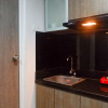 Отель Delightful Luxurious Studio Room at Taman Melati Surabaya Apartment, фото 12