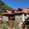 Отель Everest Summit Lodge - Monjo в Лукле