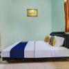 Отель SPOT ON 91159 Kost Putrana Syariah, фото 4