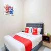 Отель OYO 90175 Tl Guest House, фото 8