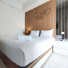 Отель Fancy And Nice 1Br With Extra Room At Amartha View Apartment, фото 6