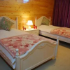 Отель Wind's Guesthouse of Lugu Hu, фото 2