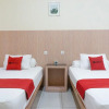 Отель RedDoorz Syariah near Sultan Muhammad Kaharuddin Airport, фото 7