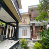Отель Capital O 93844 Arta Adi Homestay, фото 1