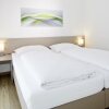 Отель Good Rooms Guntramsdorf, фото 4