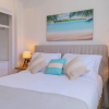 Отель Modern and Spacious Condo Steps From the Beach, фото 5
