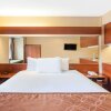 Отель Microtel Inn & Suites by Wyndham Rogers, фото 5