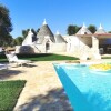 Отель Antico trullo ristrutturato con piscina e giardino, фото 7