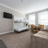 Отель Stylish Apartment 12 Minutes Tube to Oxford Street With Free Wifi and air con, фото 5