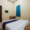 Отель Tiga Mas Inn by OYO Rooms, фото 21