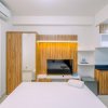 Отель Comfortable and Cozy Studio Room at Transpark Cibubur Apartment, фото 12