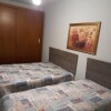 Отель Apartamento em frente a Praia Santos, фото 2
