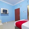 Отель OYO 90752 Ridho Guest House Syariah, фото 11