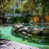 Отель Lux Apartment Cairns - 9 Pools BBQ Gym, фото 10